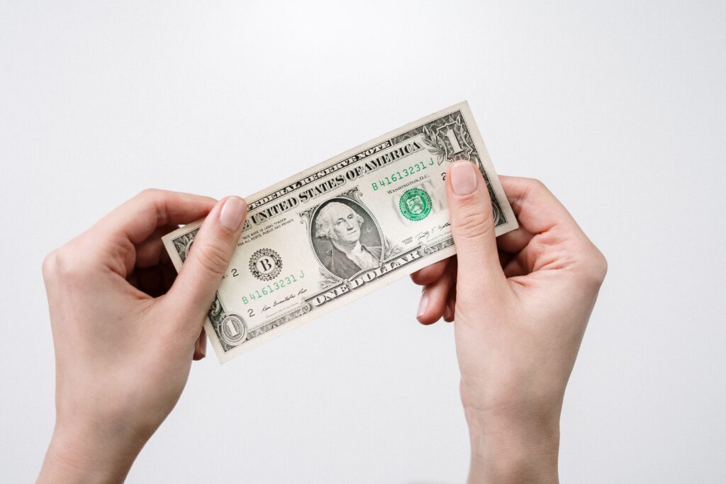 how to tell if a dollar bill is real